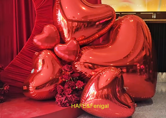 Ballons en forme de cœur en rose ou en rouge pour la Saint-Valentin et les anniversaires